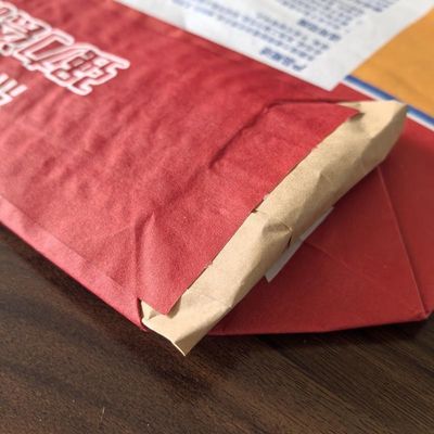 کیسه های بسته بندی سیمان با ته بلوکی 20 کیلوگرمی 25 کیلوگرمی با سوپاپ کاغذی 3 لایه 80 گرمی و 1 لایه فیلم کاغذی با آستین توکار